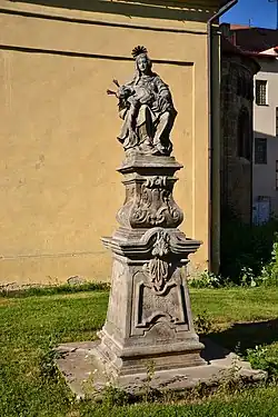Socha Piety přemístěná z Milžan do Údlic