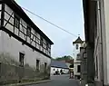Průchod na náměstí mezi domy čp. 123 a 95