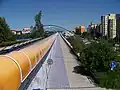 Pochozí tubus pro pěší i cyklisty, do stanice Černý most