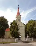 Pozdně barokní kostel Svaté Rodiny ve Veči