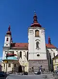 Žatec, Hošťálkovo náměstí, kostel Nanevebzetí Panny Marie.jpg