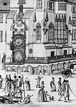Královské město Praha r. 1793, uprostřed mužská postava s pečivem (caltou) na prkně