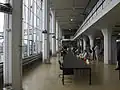 Polygonální verze hřibové hlavice, lobby – Van Nelle Factory. architekt Leendert van der Vlugt 1925–1931