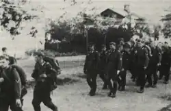 22. policejní prapor Daugava v Lucku v srpnu 1943 (lotyššský).