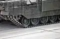 detail výfuku a zadních pojezdových kol