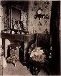 Fotografie interiéru bytu Eugèna Atgeta pořízená v roce 1910 v Paříži.