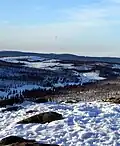 Pohled z Luzného do Luzenského údolí směrem na Březník (zimní varianta)