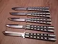 motýlky firmy Benchmade (shora: typ 67, 63, 62, 42, 47)