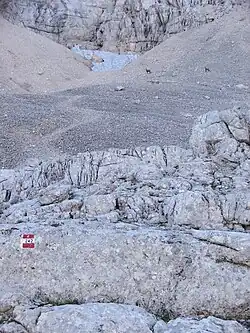 Vstup na via ferratu "Francesco Berti", která vede podél skupiny Sorapiss vysoko nad San Vito di Cadore