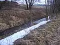 Bobr, ještě jako malý potok těsně před opuštěním České republiky.