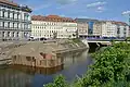 Nábřežní zástavba na Poříčí, v popředí staveniště nové náplavky (2024)