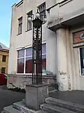 Secesní lucerna před sokolovnou