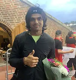 Níradž Čopra (2022)