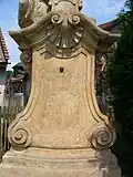 Chronogram na kříži v Uničově