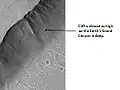 Systém Kasei Valles, pozorován z sondy HiRISE.
