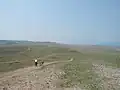 Cyklisté ve stepi poblíž Chužiru