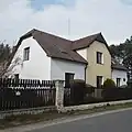 Dům, kde žila Marie Podvalová v Tišicích