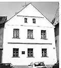 Tábor, nám. Mikuláše z Husi, dům č. p. 40 s deskou Václava Kaplického
