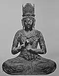 Buddha Vairóčana a bódhjangí-mudra