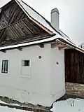 Detail štítové stěny, komína a podlomení