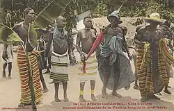 Danses des habitants de la forêt le long de la voie ferrée (Côte d'Ivoire), kolorováno