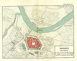 Barevná reprodukce historické mapy zachycující malé městské jádro s hradbami poblíž ramene řeky Labe
