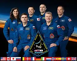 Zleva Sunita Williamsová, Jurij Malenčenko, Akihiko Hošide, Jevgenij Tarelkin, Oleg Novickij a Kevin Ford