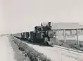 Zrekvírovaná lokomotiva R IIIc od firmy Breitfeld & Daněk s typickým vlakem polní dráhy německé armády ve druhé světové válce, kdesi v Rusku po roce 1941