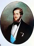 Brazilský císař Petr II. vyobrazený s velkokřížem Císařského řádu kříže. Je zde vyobrazena jak šerpa tak i řádová hvězda.