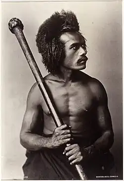 Fijian man holding a club, 1884, albumenový tisk