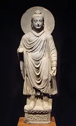 Stojící Buddha.