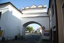 Gate at Komenského street in Velké Meziříčí, Žďár nad Sázavou District.jpg
