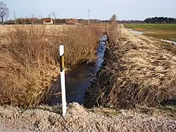Gausantė ze silnice č. 3513 Griciai - Juodaičiai - Kilupiai - Ariogala