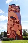Mural ve stylu Tamary de Lepmicki v Gdaňsku
