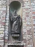 Plastika sv. Vojtěcha na průčelí kostela