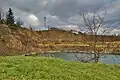 Bývalý, dnes zatopený, lom Helišova skála