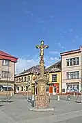 Kamenný kříž na náměstí z roku 1803