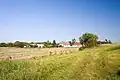 Pohled na Hrádek z cesty do Radíkovic