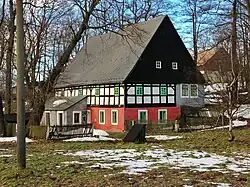 Usedlost čp. 207 v Krásném Lese, bývalý vodní mlýn ze 17. století