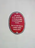 Recesistická cedule na domě v Hrdlořezské ulici