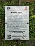 Informační tabule u hrobu Františka Webera na Olšanských hřbitovech