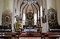 Interiér kostela sv. Martina s kazatelnou ve tvaru velryby