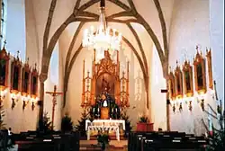 Interiér farního kostela sv. Bartoloměje v České Bělé.
