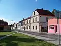 Brandýská ulice s hostincem U Antošů
