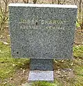 Symbolický hrob J. Charváta na Čestném pohřebišti popravených a umučených z padesátých let (III. odboj) na Ďáblickém hřbitově