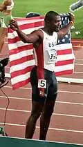 Justin Gatlin oslavuje vítězství v běhu na 100 metrů.