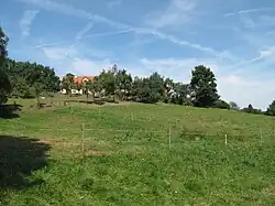 Dům a pastviny