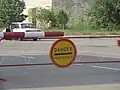 Závora vedoucí do černobylské uzavřené zóny