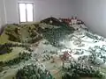 Model ukazující polohu sakrálních staveb v krajině v okolí města