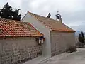 Kaple sv. Matouše ze 17. století se hřbitovem